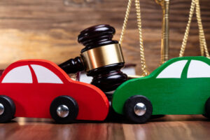 Two Green And Red Wooden Cars