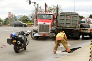 18-wheeler truck causes injuries and death for a motorcycle driver